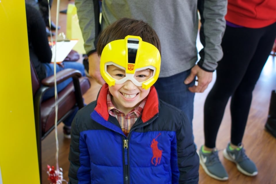 A young student enjoying an event at Genie Academy
