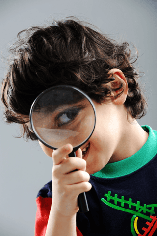 portrait-of-child-looking-closely-with-magnifying-glass_rtOSTyCro.jpg