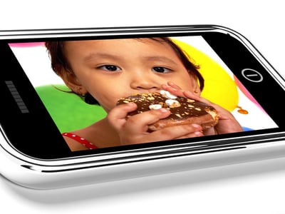 mobile-phone-picture-of-kid-eating-a-donut_G1TRVQDu