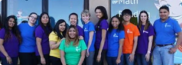 Genie Academy assessment team in front of a center