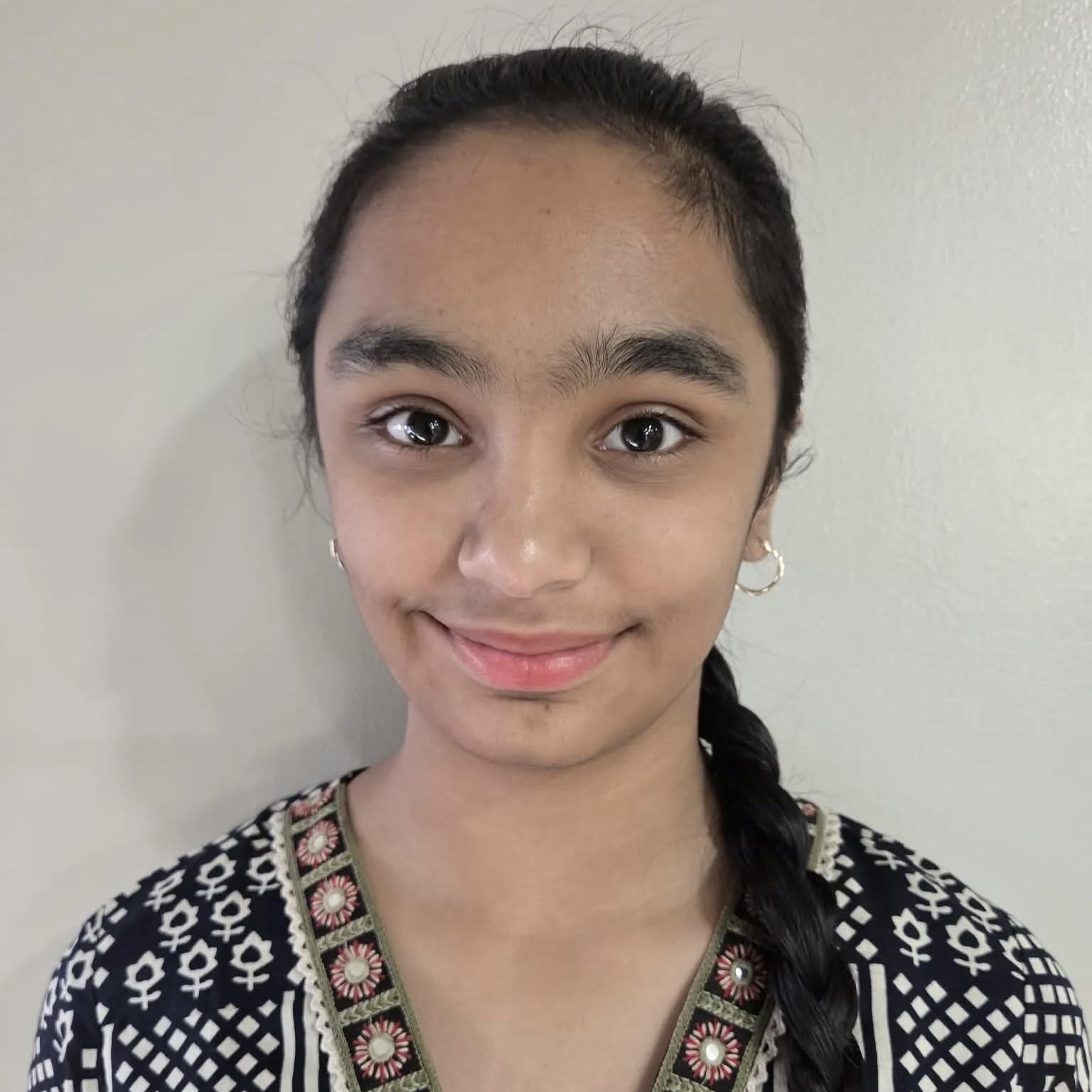 Khushi, a Genie Academy math student, smiling in her portrait